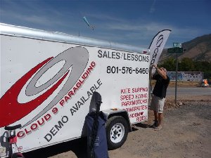 Steve setting up gear..inflatable paddle board in fore ground.JPG
