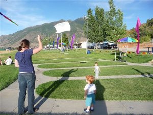 hand made paper kite flown for first time by new 8 month old kiter... lots of new kiter kids yeah!.JPG